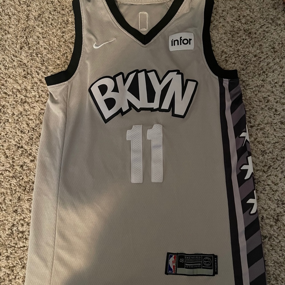 Kyrie Irving nets jersey